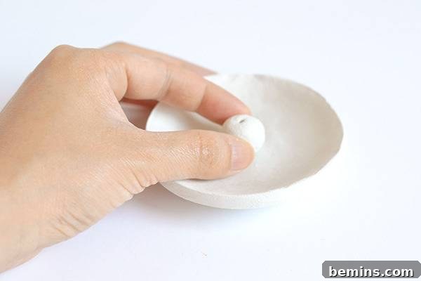 Attaching the ball to the bowl