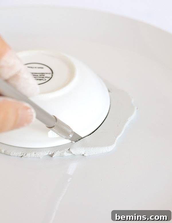 Cutting out the clay circle