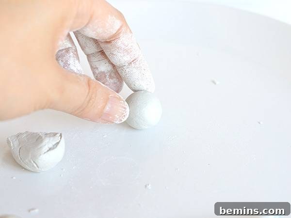 Rolling a small clay ball
