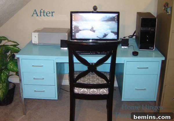 An after picture shows a baby blue desk with a screen on it and a chair with it.