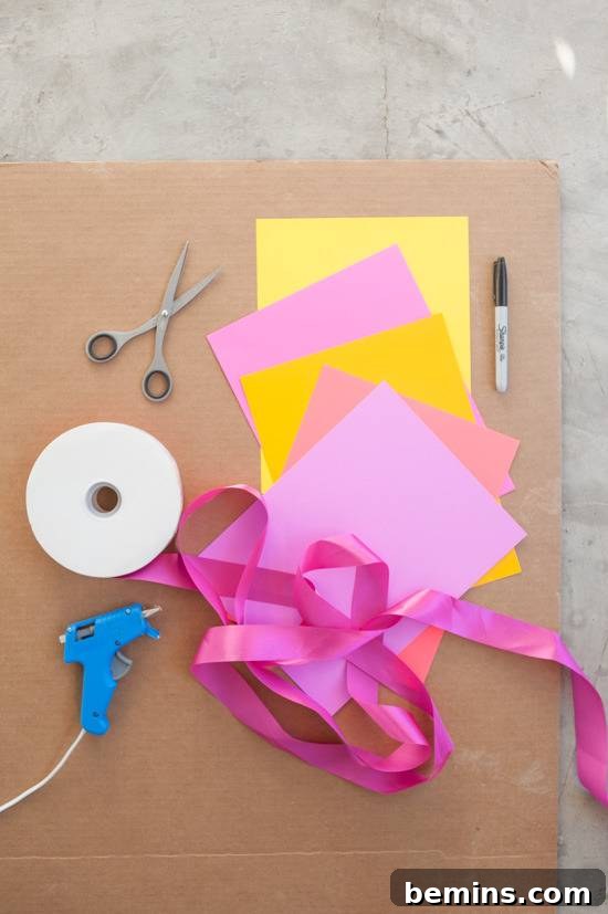 Craft Your Own Bird Costume: A Step-by-Step Guide 3 Craft tools are sitting on a cardboard sheet.