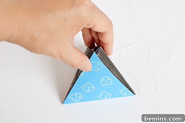 DIY printable halloween decorations - sticking remaining tabs