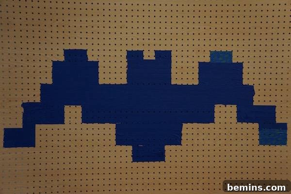 Spooky & Bright: LED Rope Light Halloween Yard Art 4 Bat outline on the pegboard