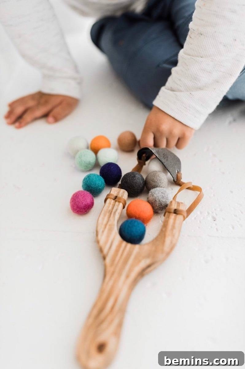 Pom pom slingshot