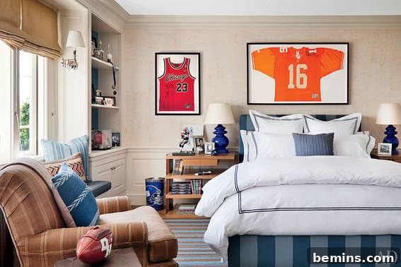Built-in shelves in a bedroom displaying sports memorabilia, with a mounted jersey serving as wall art.