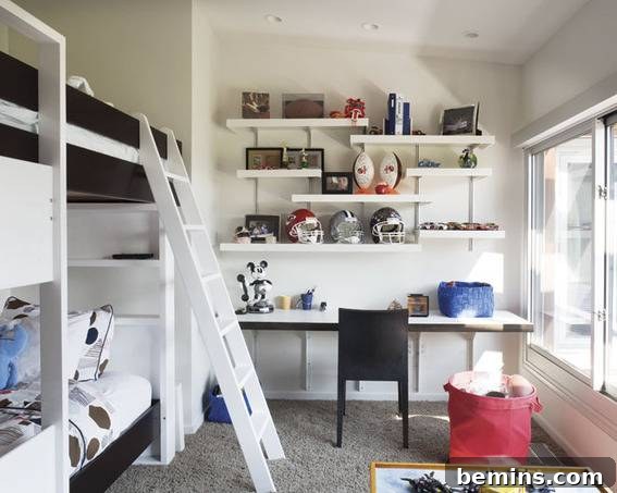 White shelves staggered on a wall above a white desk, next to a white bunk bed, showcasing a clean and adaptable display for sports memorabilia.