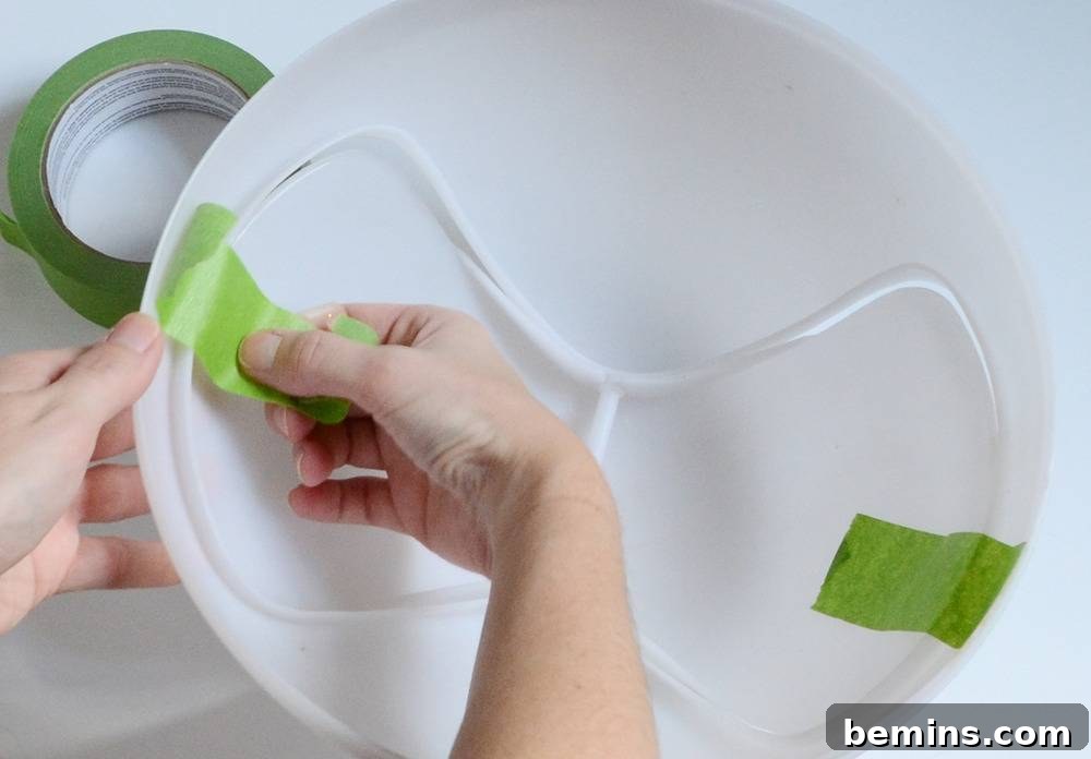 Taping off the trash can lid