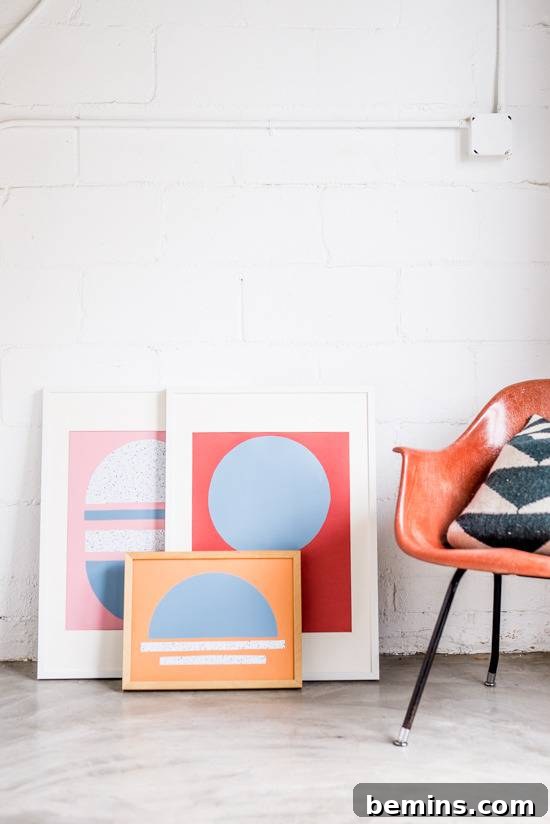 Craft Quick Wall Art: A 30-Minute DIY Project 11 Several colorful paintings sit next to an orange chair.