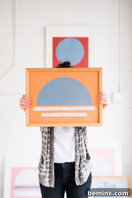 Craft Quick Wall Art: A 30-Minute DIY Project 15 A person holds a frame in front of their face.