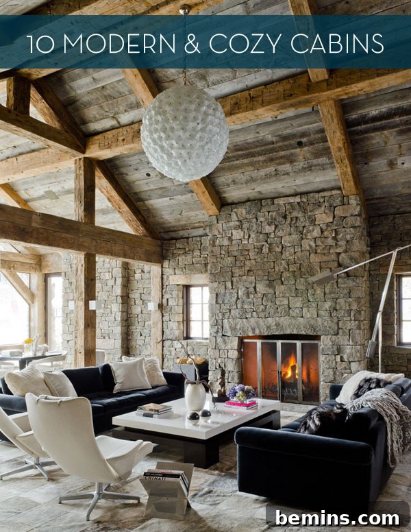 Visual Delight: 10 Modern Yet Cozy Cabins Perfect for a Woodland Escape 2 Stone cabin interior with a fireplace, wooden ceiling, white globe pendant light, and black sofas.