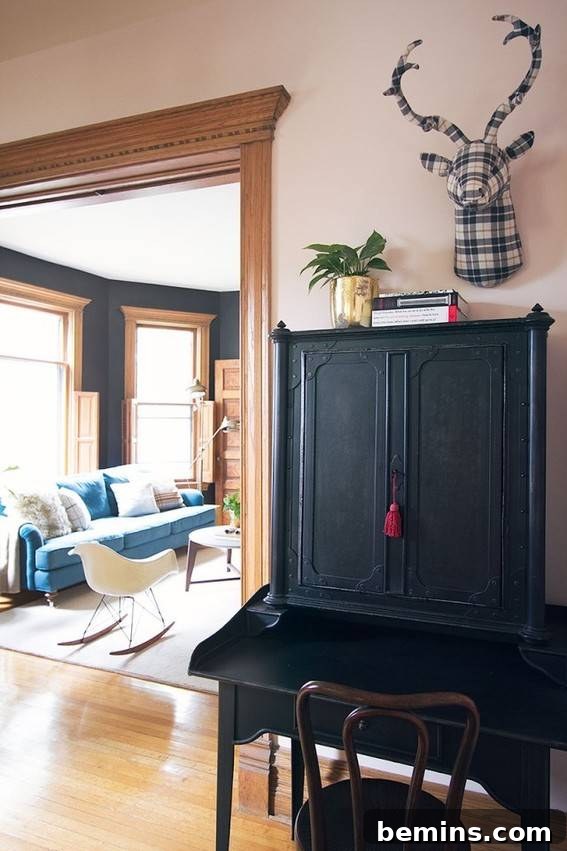 Plaid Power: 10 Rooms Where Tartan Truly Shines 11 A unique faux taxidermy piece, adding an unexpected touch to the decor.