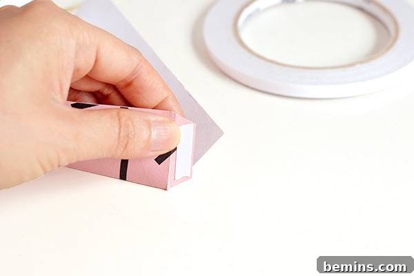 Applying glue to the tabs