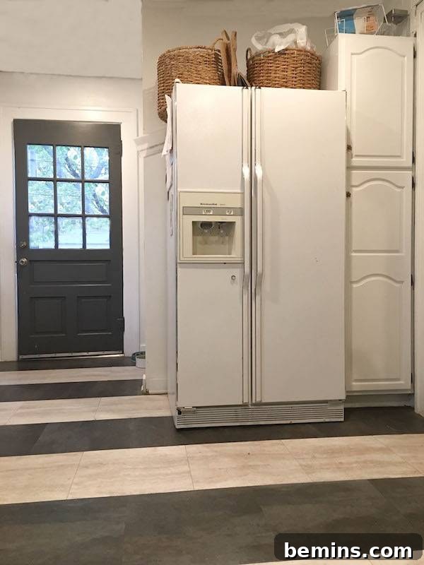 Vertical View of the Unorganized Pantry and Fridge Top