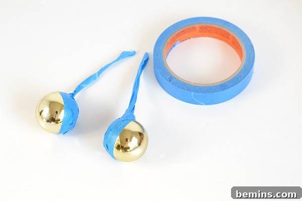 Taping the Baubles for Painting