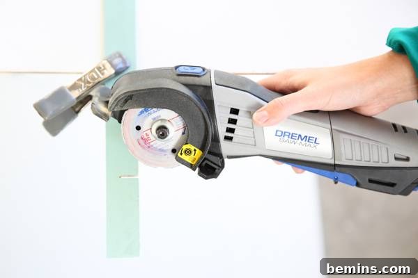 A Dremel tool is ready for cutting wood.