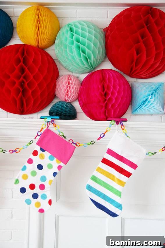 Unconventional Christmas Decor: 11 Fresh Color Palettes 10 Decorations hang over stockings hanging, showcasing a colorful Christmas theme.