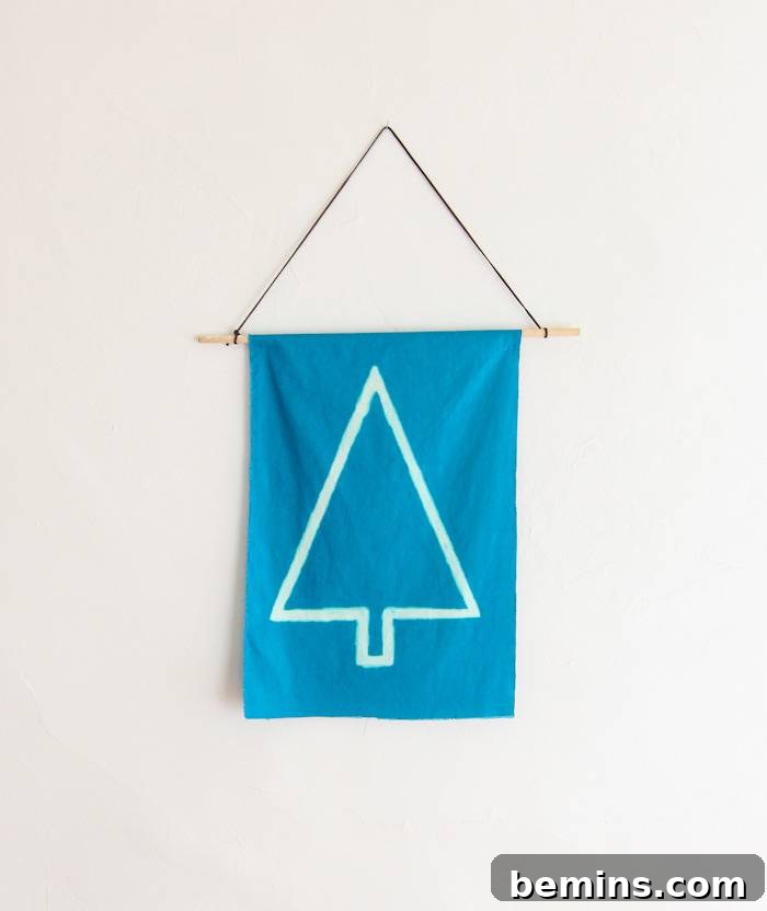 Modern Christmas wall hanging made from fabric scraps