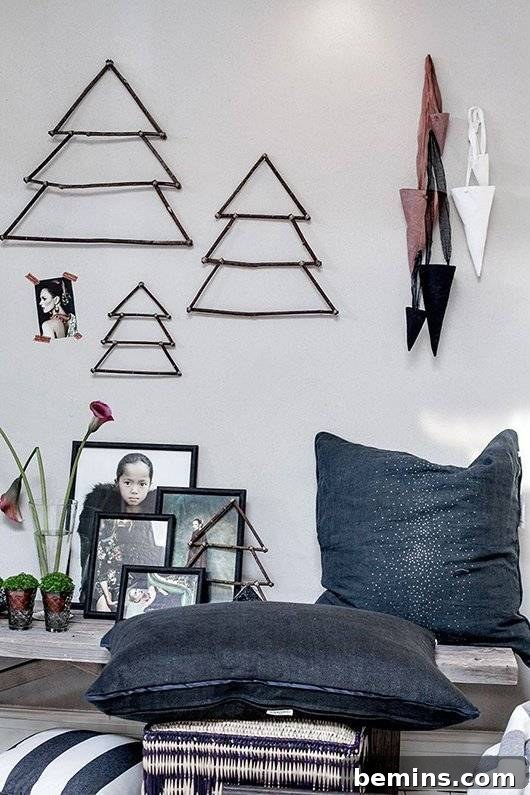 Scandinavian-inspired Christmas tree designs hanging on a wall