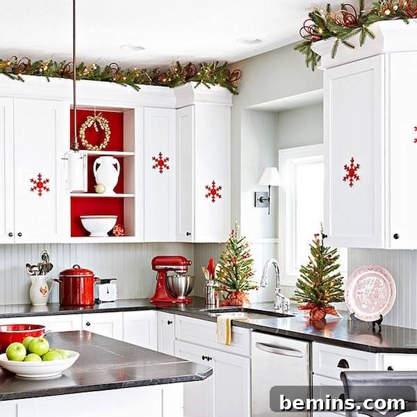 Christmas kitchen with a red KitchenAid mixer and snowflake decorations