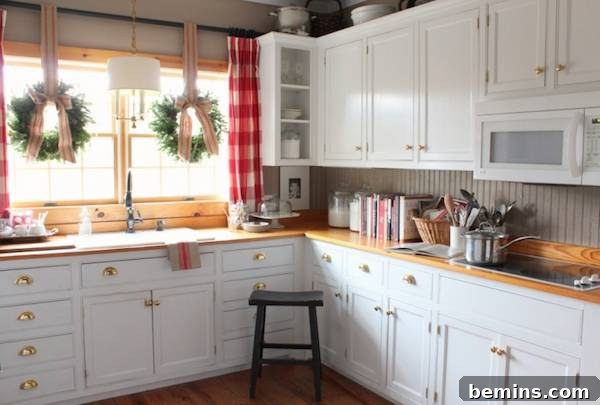 Christmas kitchen with checked curtains and wreaths