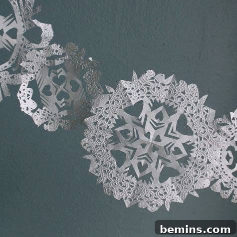 Intricate snowflakes crafted from delicate paper doilies.