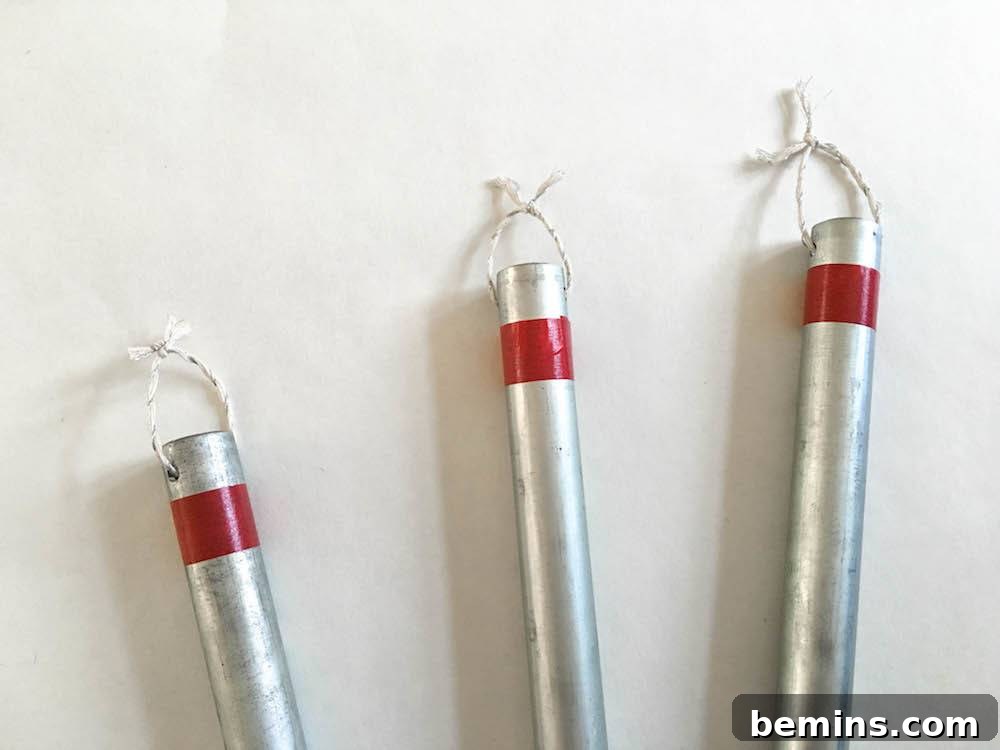 Washi tape being applied to Christmas Bells