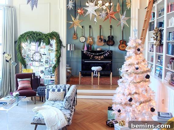Rooms decorated with hanging stars and typographic garland, showcasing a colorful and eclectic Christmas style.
