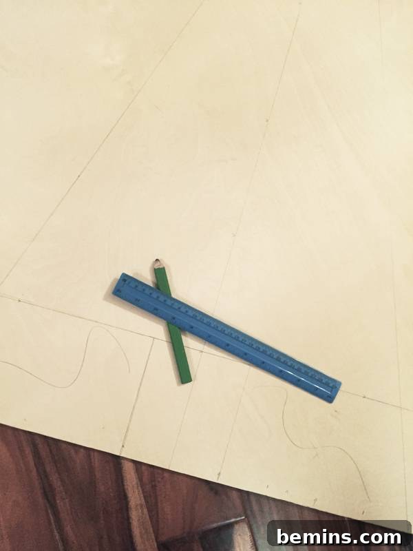 Ruler and pencil used for drawing plans, essential tools for DIY projects.
