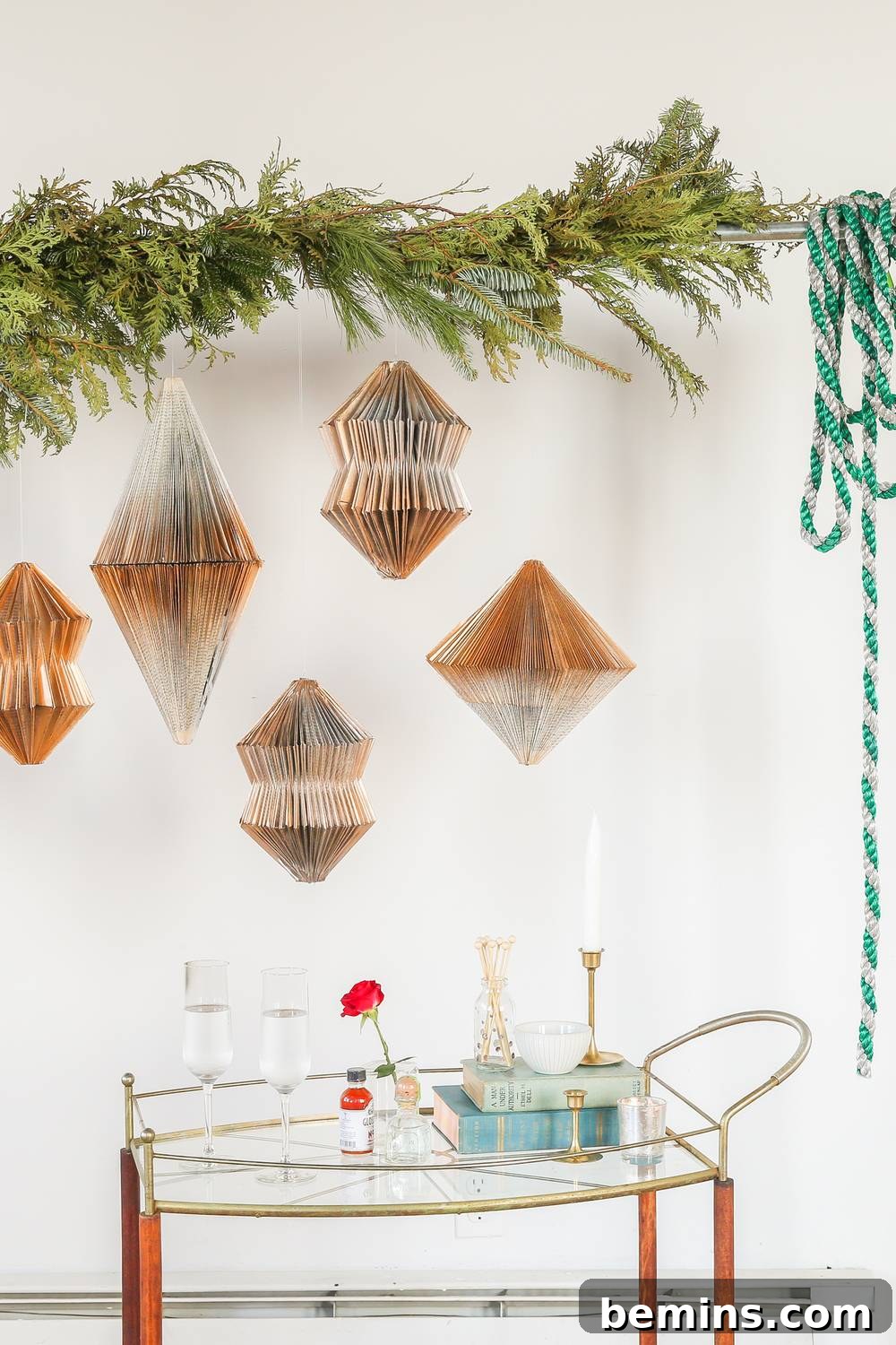 A bough displaying ornaments over a glass table