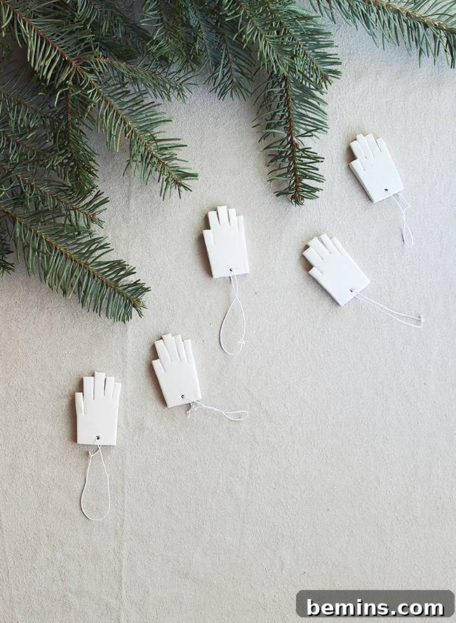 Handmade art featuring handprints on a wall