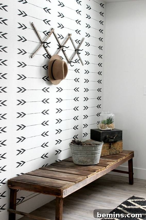 A mudroom with a bench and hatrack.