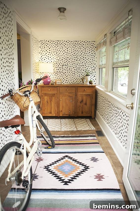 Bicycle, wood cabinet, table lamp on the mudroom.