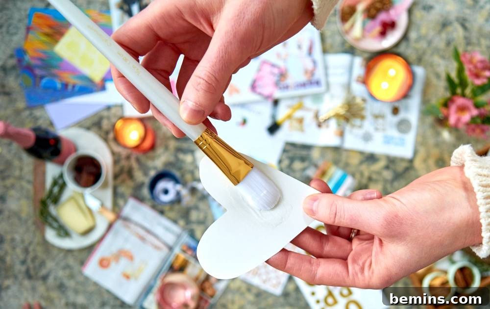 Affixing clippings to a vision board