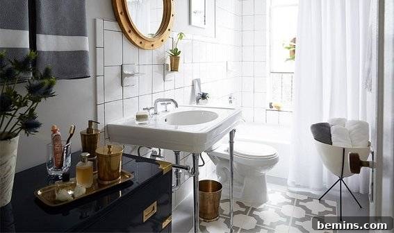 A well-furnished bathroom with a strategically placed dresser for storage.