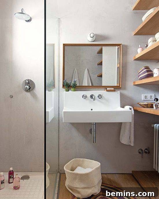 A well-furnished bathroom with deep shelves above the radiator.