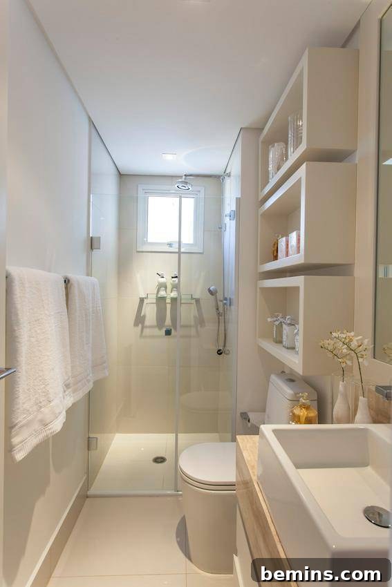 A fully furnished narrow bathroom with creative open storage above the toilet.