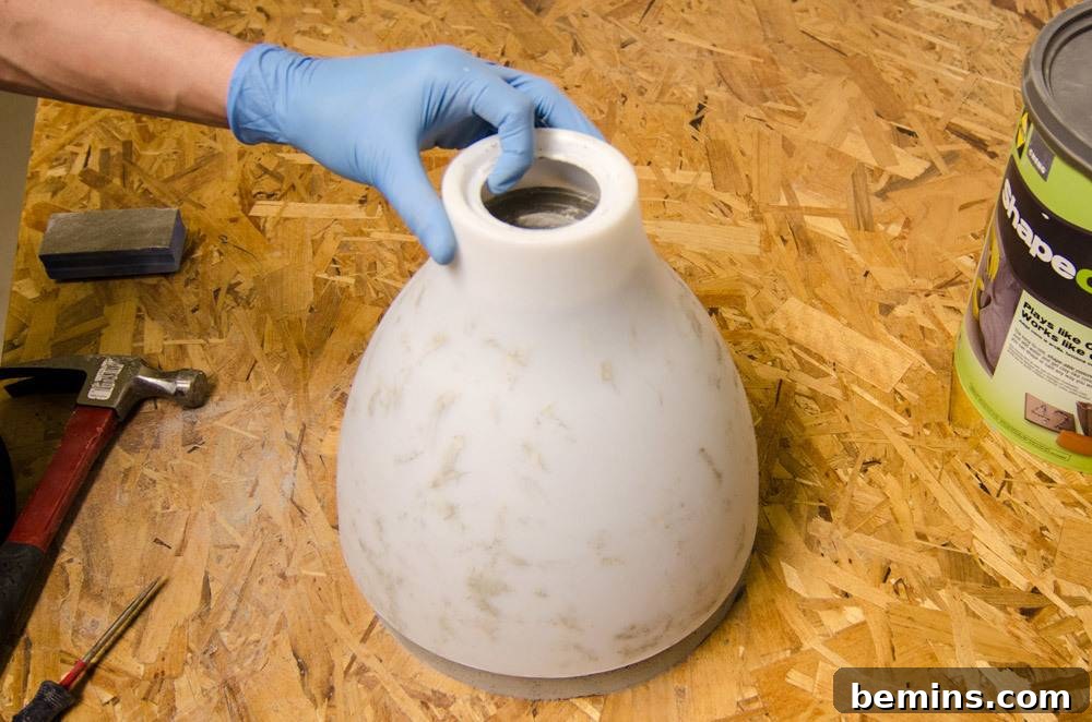 IKEA Upgrade: Crafting a Chic Concrete Pendant Light 14 Working on the ceramic piece