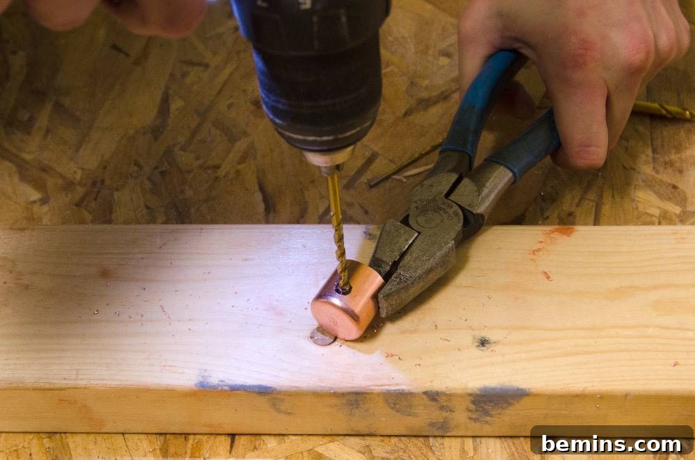 IKEA Upgrade: Crafting a Chic Concrete Pendant Light 23 Drilling a hole in the copper cap