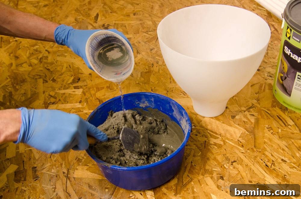 IKEA Upgrade: Crafting a Chic Concrete Pendant Light 5 Mixing ShapeCrete to a clay-like consistency