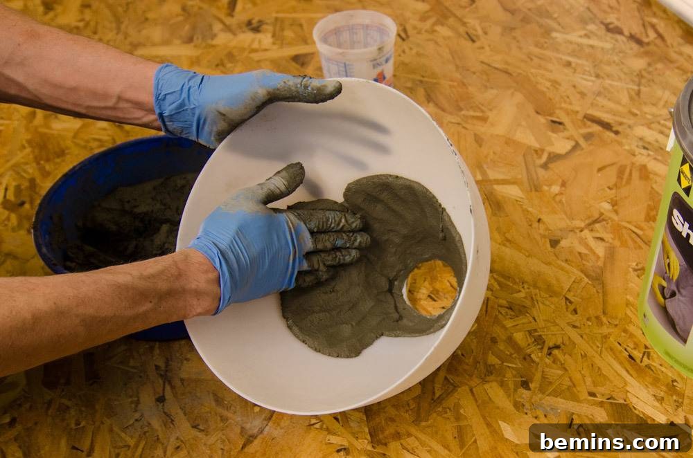 IKEA Upgrade: Crafting a Chic Concrete Pendant Light 7 Packing ShapeCrete into the IKEA lamp mold