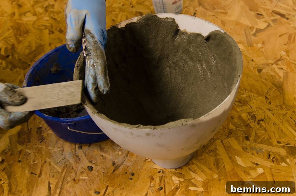 IKEA Upgrade: Crafting a Chic Concrete Pendant Light 8 Smoothing the rim of the concrete pendant