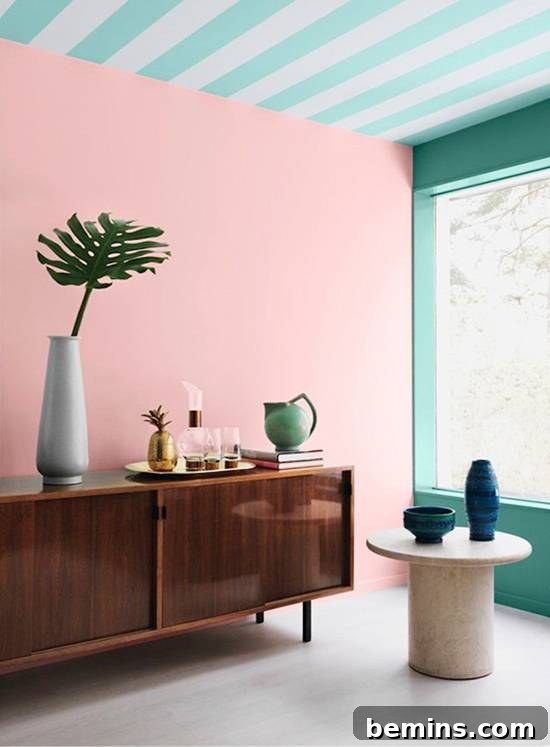 Living room with pastel pink walls and vintage decor