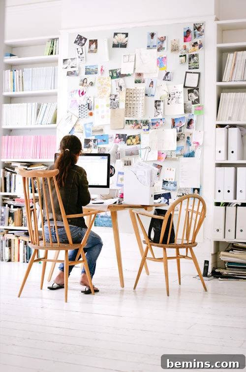 Workspace with Floor-to-Ceiling Shelving for Maximum Storage