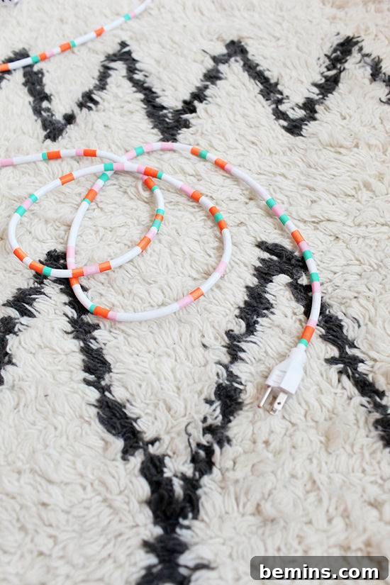Desk De-Clutter: 10 Creative DIY Storage Solutions 8 Washi Tape Cord Wrap DIY Desk Storage
