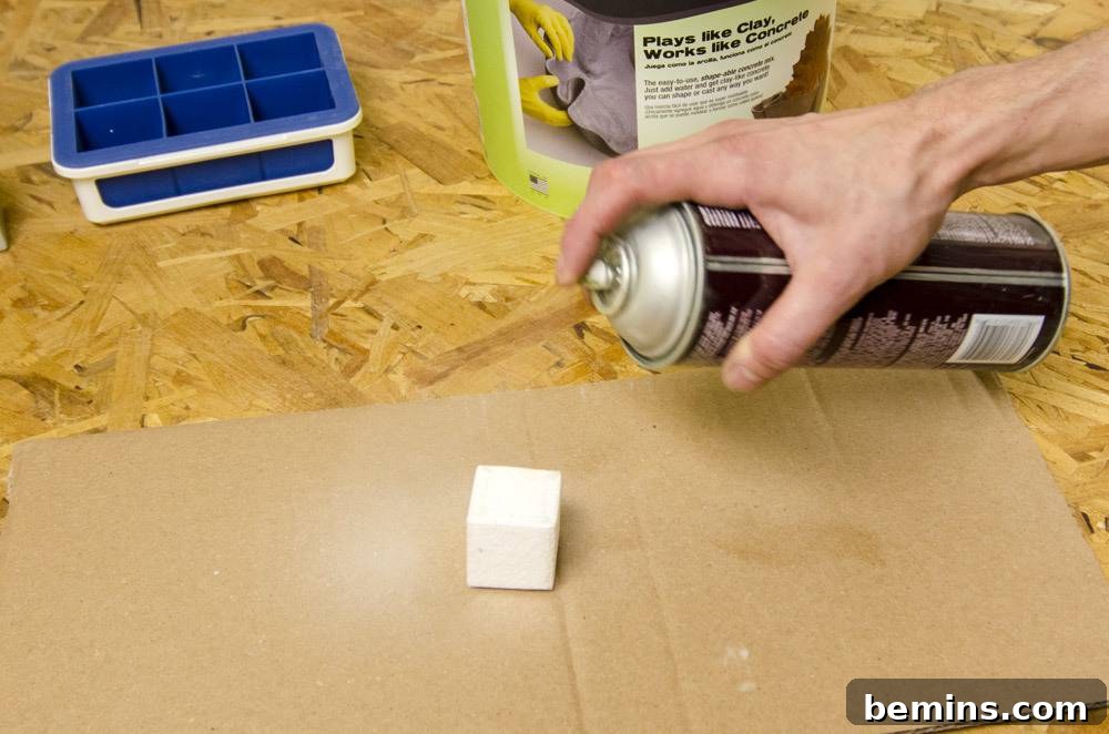 Spraying Styrofoam with Adhesive
