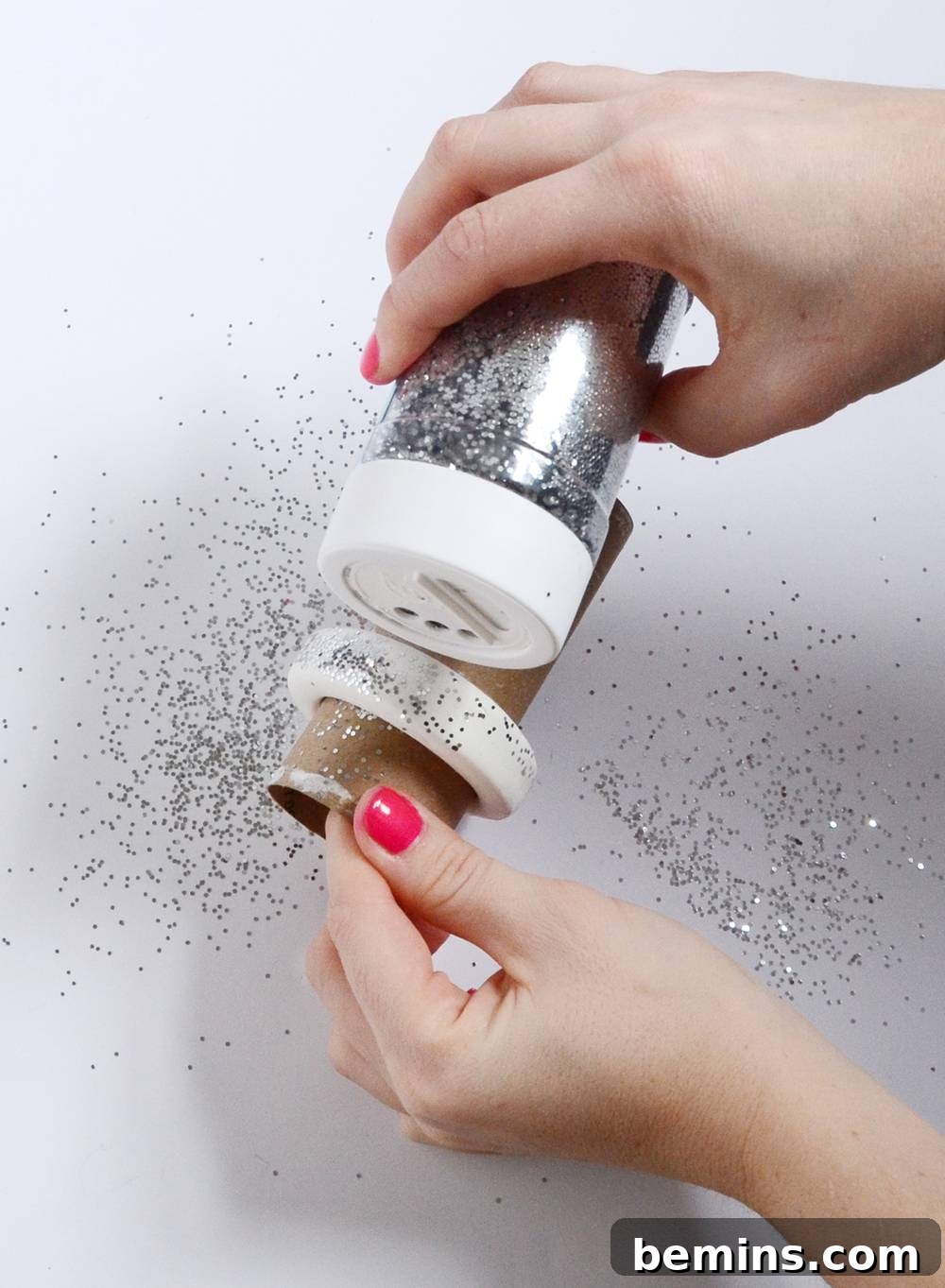 Applying glitter to the napkin ring