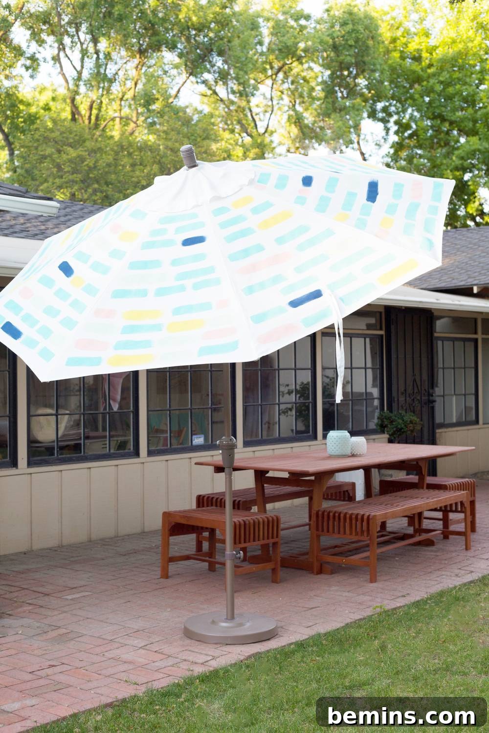 Patios with spring vibes featuring a painted patio umbrella