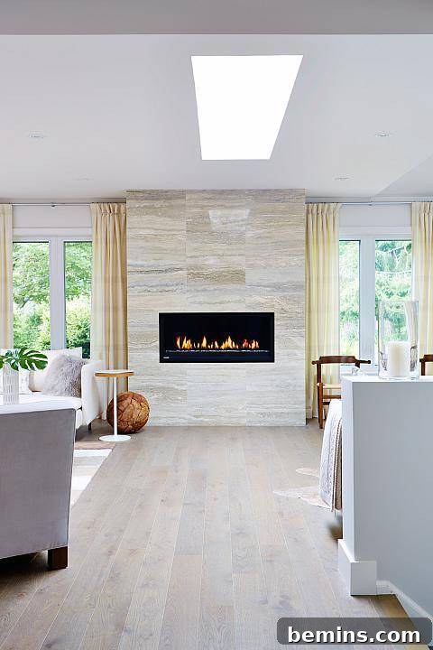 Contemporary Living Room with Marble Slab Fireplace