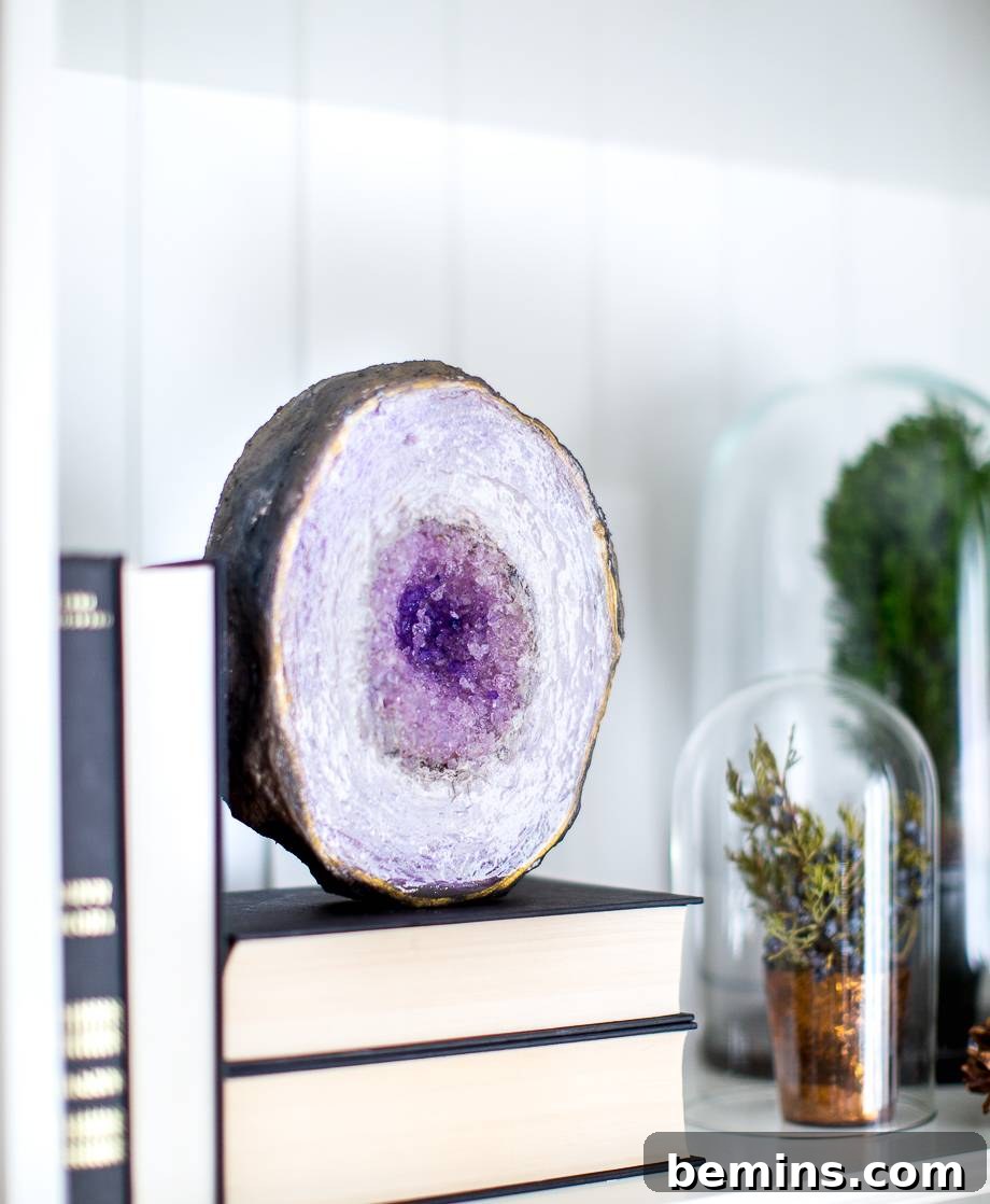 Totally Rockin' DIY Projects: Amp Up Your Creativity 3 A DIY faux amethyst geode bookend adds a touch of elegance to any bookshelf.