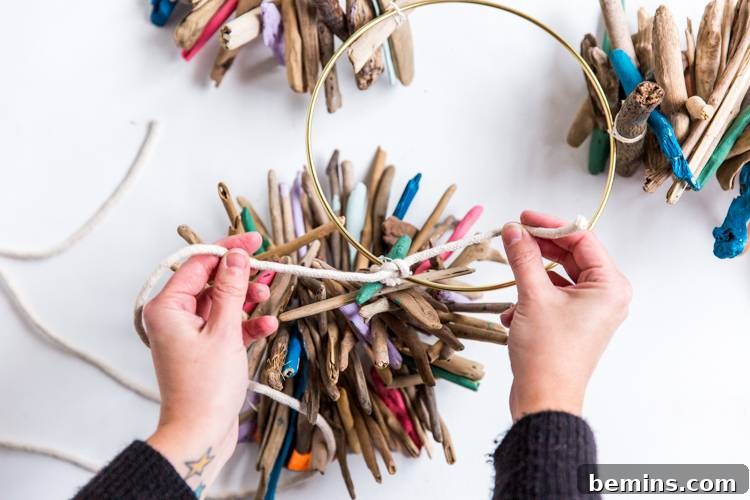 Driftwood Dreams: Crafting a Coastal Hanging Mobile 8 Attaching Cording to Hoop and Driftwood